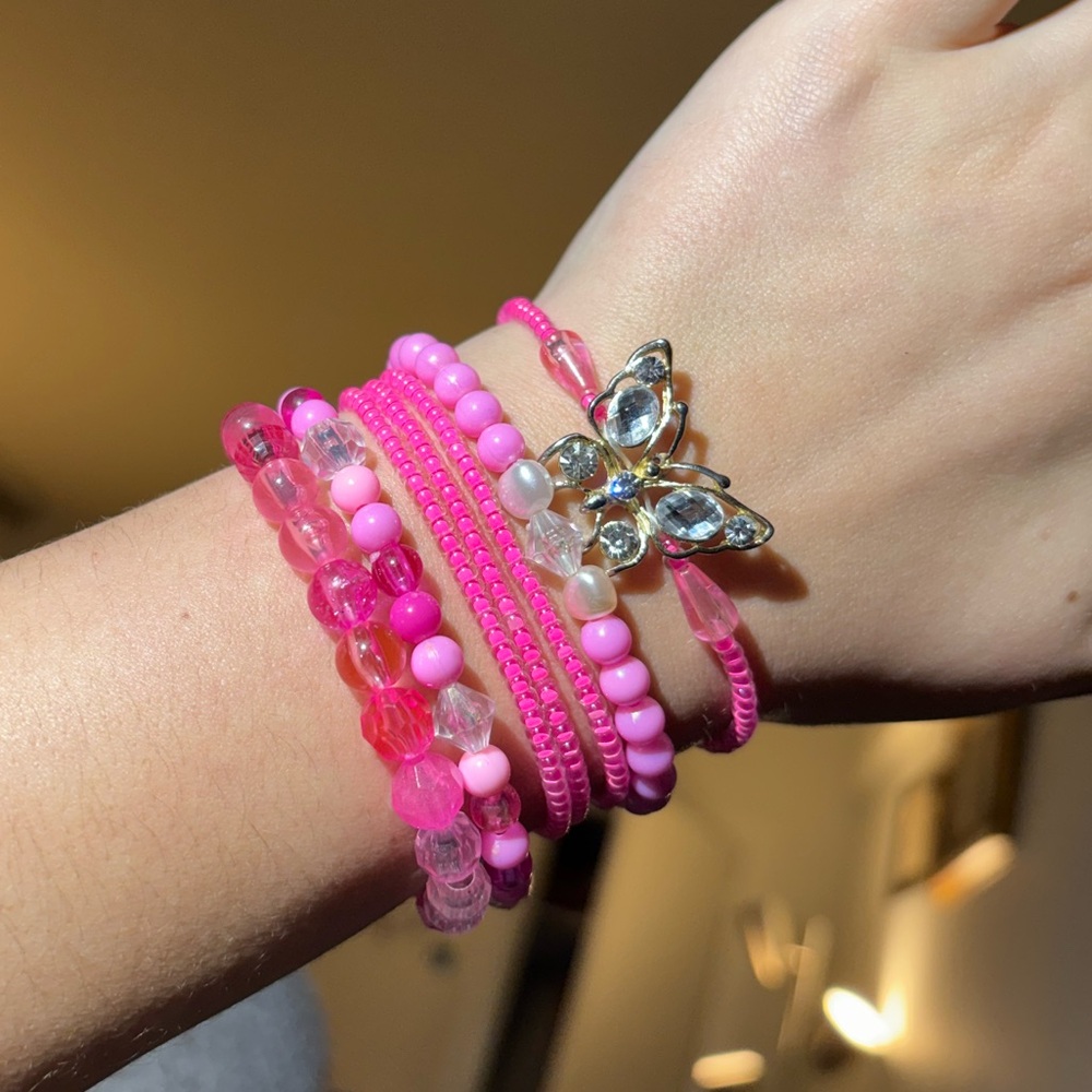 Collection of pink bracelets for summer